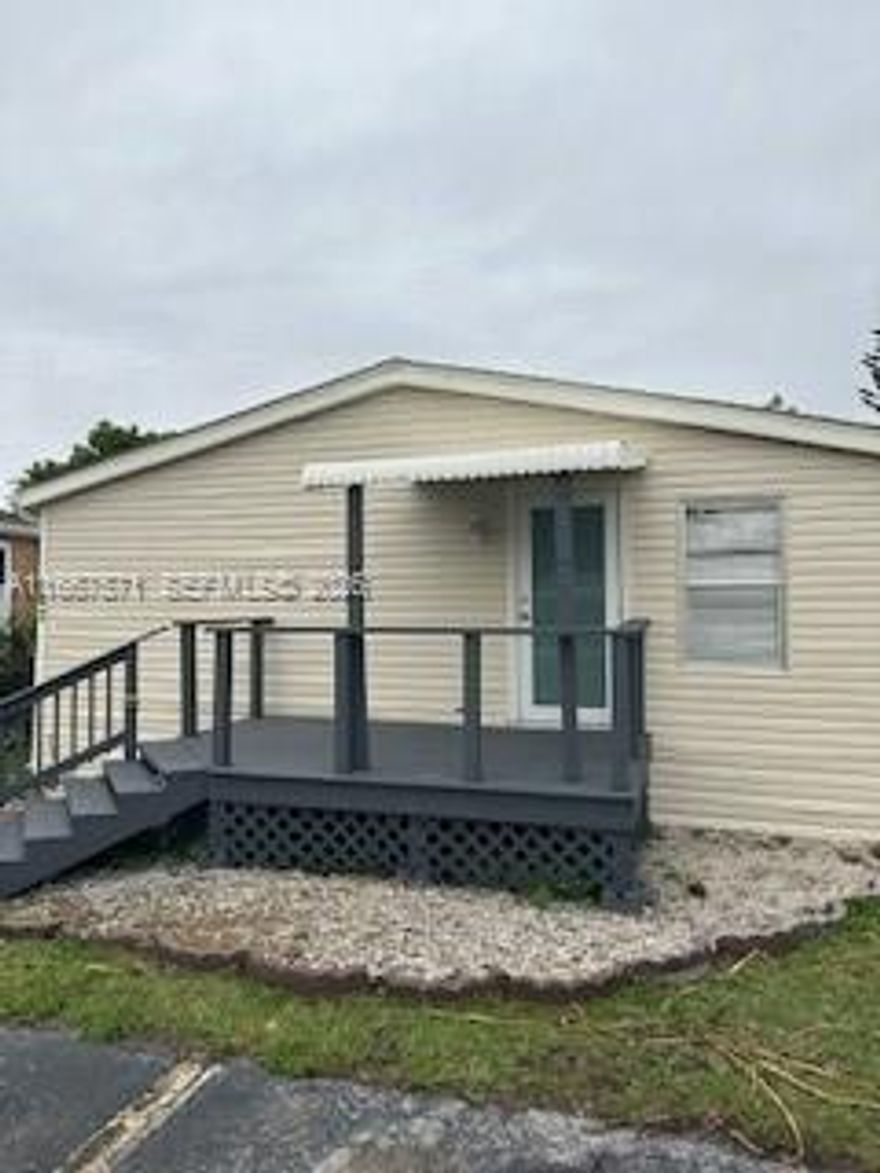 Located on the lake,In a cul-de-sac. It features a new water heater, low HOA fees, and you own the land. Financing options are available.