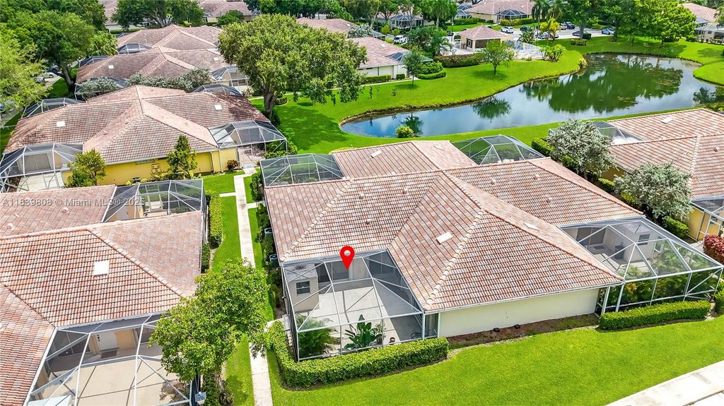 Photo of 9189 Sun Terrace Cir #B, Palm Beach Gardens, FL 33403 (MLS # A11839808)