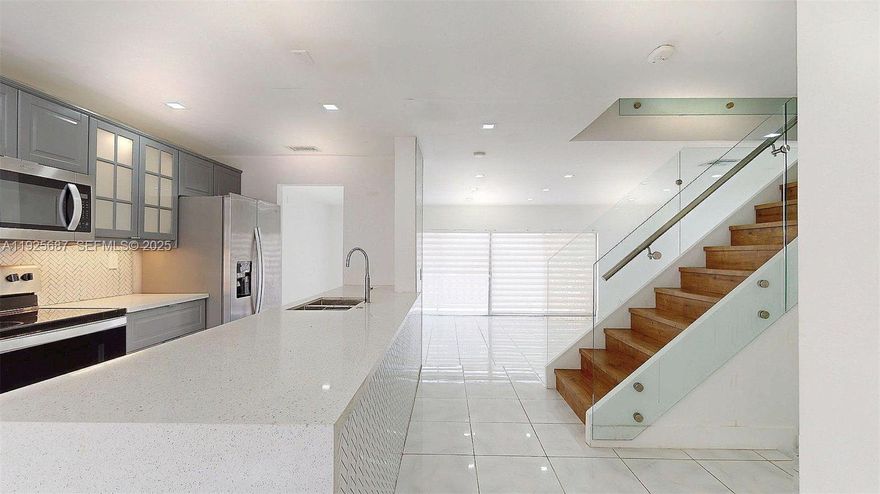 Stunning and fully remodeled 4 bedroom, 2.5 bathroom townhome located in the desirable Townhouses at Jacaranda in Plantation. This beautiful two story home has been completely updated with modern finishes throughout, offering a fresh, elegant, and move in ready feel. The spacious living and dining areas flow seamlessly into a remodeled kitchen featuring contemporary cabinetry, updated countertops, and plenty of storage. In unit laundry adds extra convenience.
All bedrooms are generously sized, including a beautifully updated primary suite with great closet space. Step outside to a private and stylishly finished patio, perfect for relaxing or entertaining.
The community is well maintained and ideally located near parks, shopping, restaurants, top schools and major highways. If you're looking for a fully renovated, spacious and centrally located home in Plantation, this is the one.