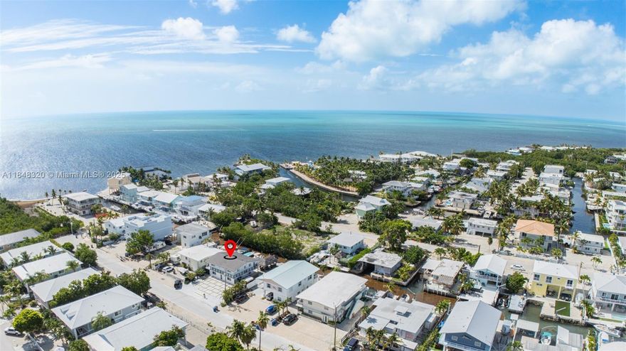 Step into this beautifully maintained home nestled in one of the most desirable neighborhoods in the Florida Keys. This charming residence offers the perfect blend of comfort, style, and island living. From the moment you arrive, you'll be captivated by the lush landscaping, serene surroundings, and the pride of ownership that shines throughout. Inside, you'll find spacious living areas filled with natural light, a thoughtfully designed kitchen, and cozy bedrooms that invite relaxation. Whether you're enjoying a quiet evening on the patio or entertaining guests, this home provides the ideal setting for making lasting memories. Located just moments from world-class boating, fishing, dining, and the vibrant Key Largo lifestyle, this property is more than just a home.