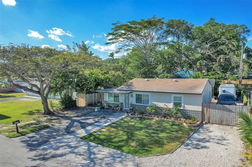 Renovated 3-Bedroom, 1-bathroom single-family Home in Prime Fort Lauderdale Location NEAR MARINA– No HOA! BRING YOUR WORK TRUCKS AND R.V. BOTH SIDES ACCESIBLE. Located in the highly desirable Marina Mile area of Fort Lauderdale, where new construction homes are selling for millions! This home features a newer renovated KITCHEN, modern lighting fixtures, NEW FLOORING, a newer tankless water heater, and a NEWER CENTERAL A/C UNIT. A NEWER ROOF was replaced in 2021.  IMPACT WINDOWS AND DOORS DONE 2025. An additional workshop space adds extra versatility. Located just minutes from I-95, Fort Lauderdale-Hollywood International Airport, and the beaches, this property is perfect for first-time homebuyers  given its proximity to top attractions, marinas, and year-round events.
