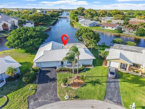 Photo of 9403 NW 74th Pl, Tamarac, FL 33321 (MLS # A12004652)