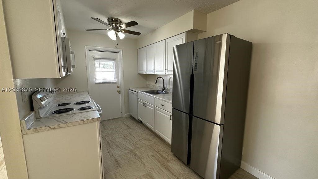 Photo of 7480 SW 10th St #202A, North Lauderdale, FL 33068 (MLS # A12039870)