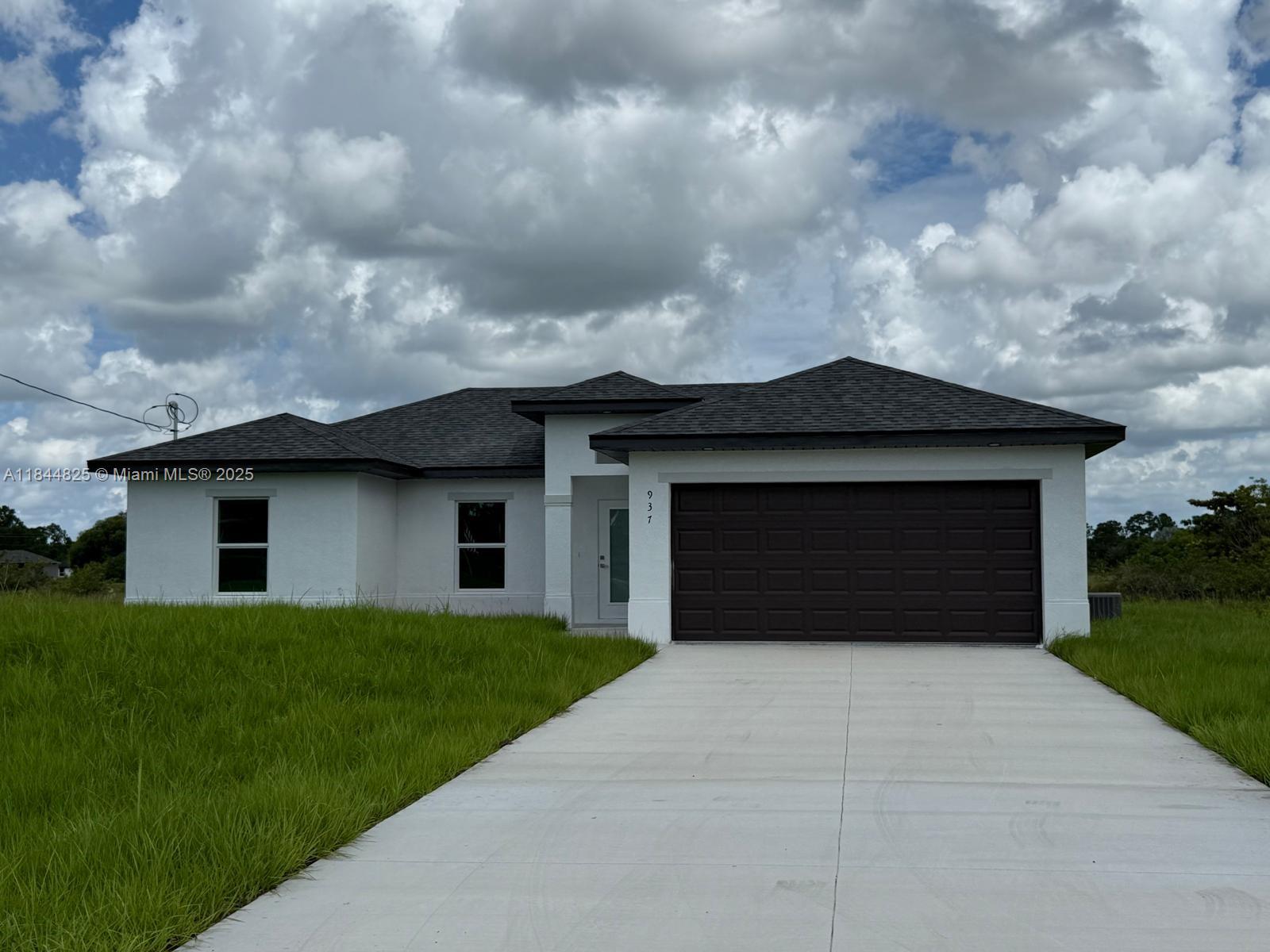 Experience the best of Florida living in this beautiful new construction single-family home in Lehigh Acres. Enjoy the lake views from the
comfort of your own home, perfectly situated to take in the serene surroundings. This home features 3 spacious bedrooms, including a master
bedroom retreat, 2 bathrooms, 2-car garage for ample storage and parking, porcelain floors throughout for durability and style, Stainless steel
appliances for a sleek look. The open floor plan is perfect for entertaining and everyday living. Enjoy the peaceful atmosphere from your back
patio . This home offers the perfect blend of relaxation and Florida living. Don't miss out on this incredible opportunity, a must see!