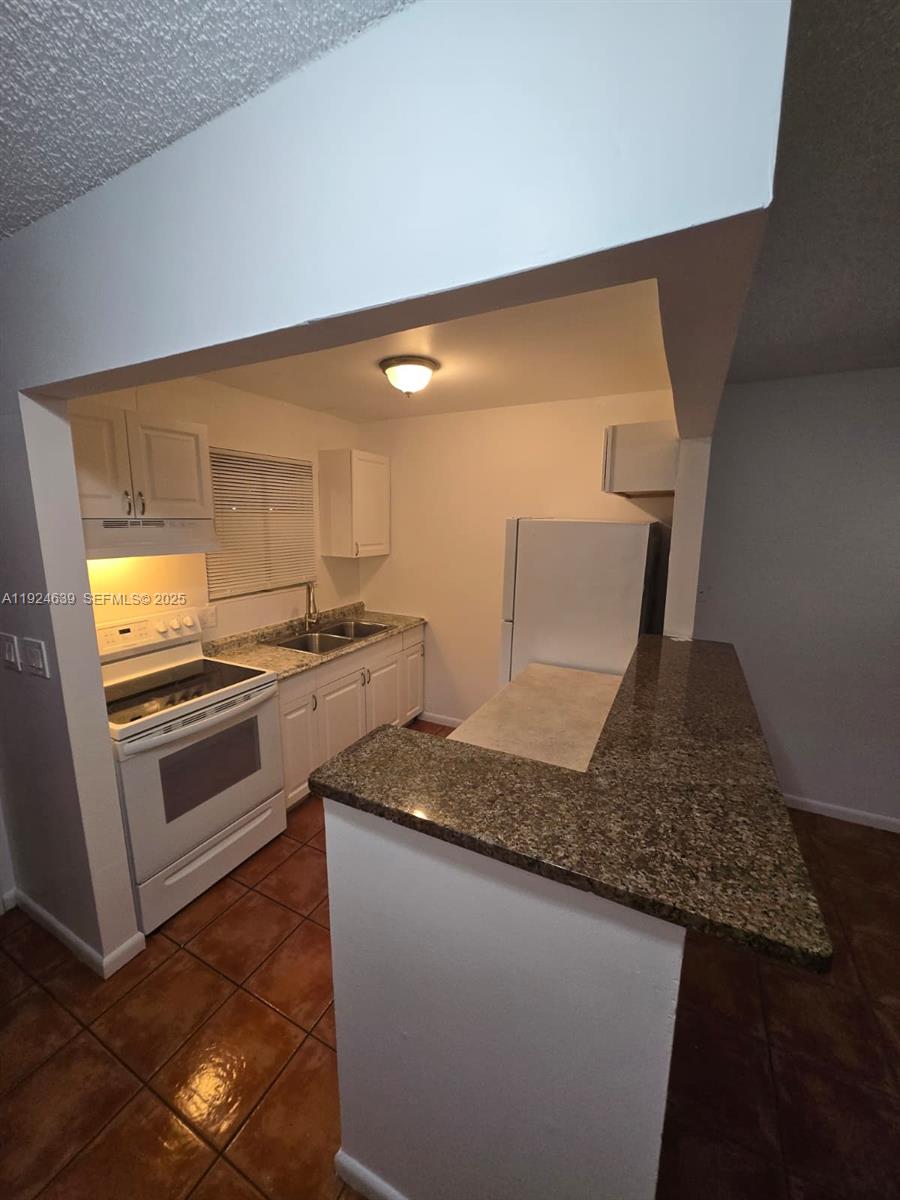 FOREST HILL GARDENS CONDO - Residential Lease