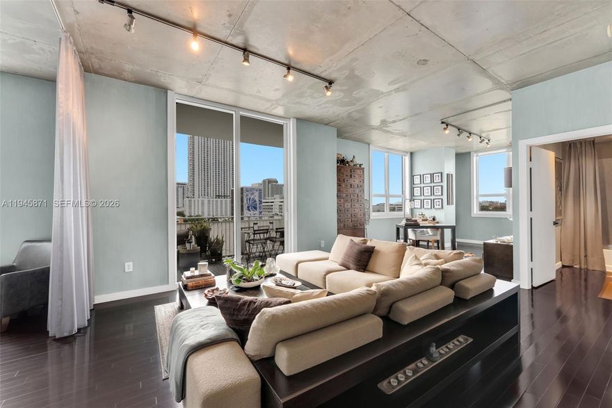 Welcome to your new 2-bedroom loft style condo in the center of Edgewater. Brazilian Cherry hardwood floors throughout, walls professionally painted with faux finish, integrated speakers installed throughout residence, dedicated parking space, Lutron Smart installed for lighting control and enhanced energy efficiently, climate control, updated faucets, updated appliances within the last 3 years. Combine with a true open space concept, bringing a true artist masterpiece.