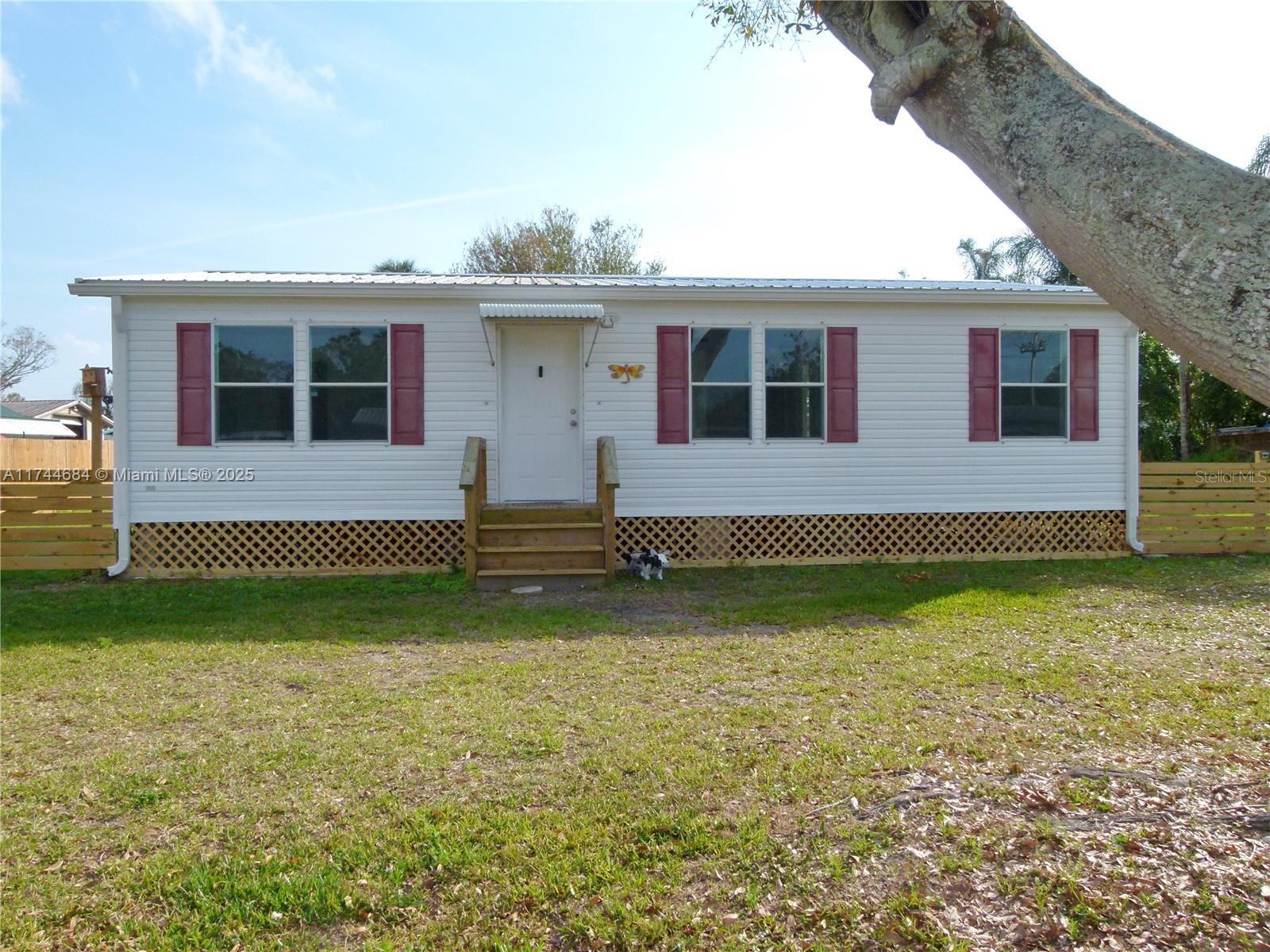TREASURE ISLAND – Well-Maintained 3/2 Manufactured Home This charming 3-bedroom, 2-bathroom manufactured home features a brand-new metal roof (2023) and a relatively new AC for added comfort. Recent upgrades include a new shed, washer, dryer, stove, and dishwasher (all 2023). Enjoy a spacious, fenced backyard—perfect for pets and outdoor activities—complete with an avocado and banana tree for a touch of tropical living.