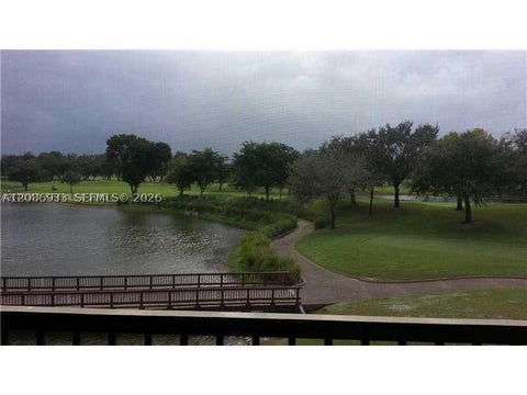 Photo of 3001 W Rolling Hills Cir #407, Davie, FL 33328 (MLS # A12086933)