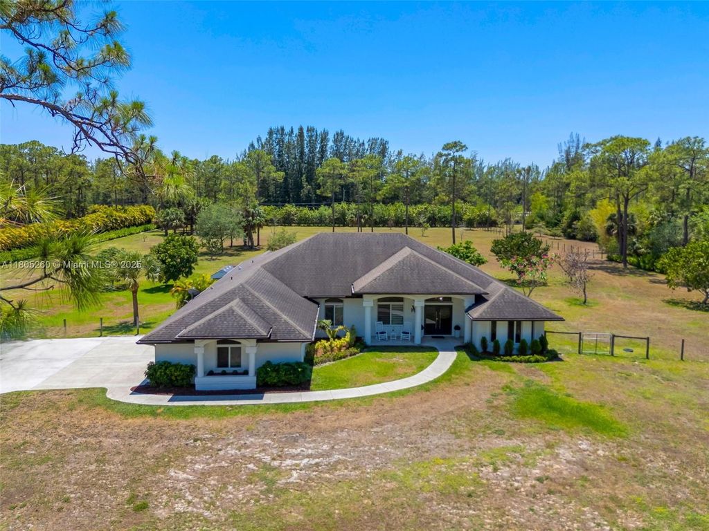 Photo of 14505 Black Bear Rd, Palm Beach Gardens, FL 33418 (MLS # A11805260)