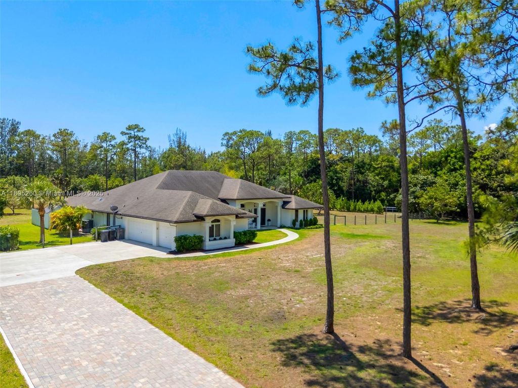 Photo of 14505 Black Bear Rd, Palm Beach Gardens, FL 33418 (MLS # A11805260)