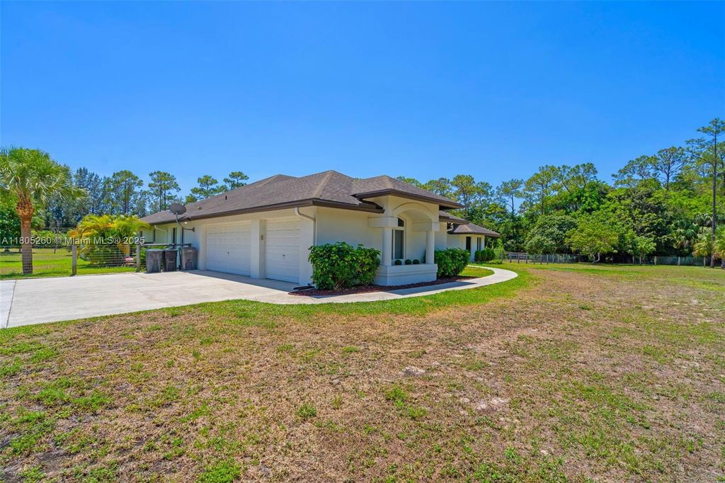 Photo of 14505 Black Bear Rd, Palm Beach Gardens, FL 33418 (MLS # A11805260)