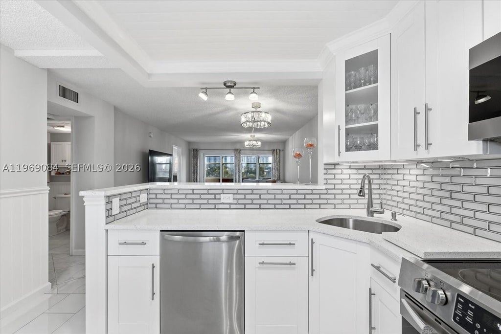 Photo of 3201 NE 8th St #405, Pompano Beach, FL 33062 (MLS # A11969084)
