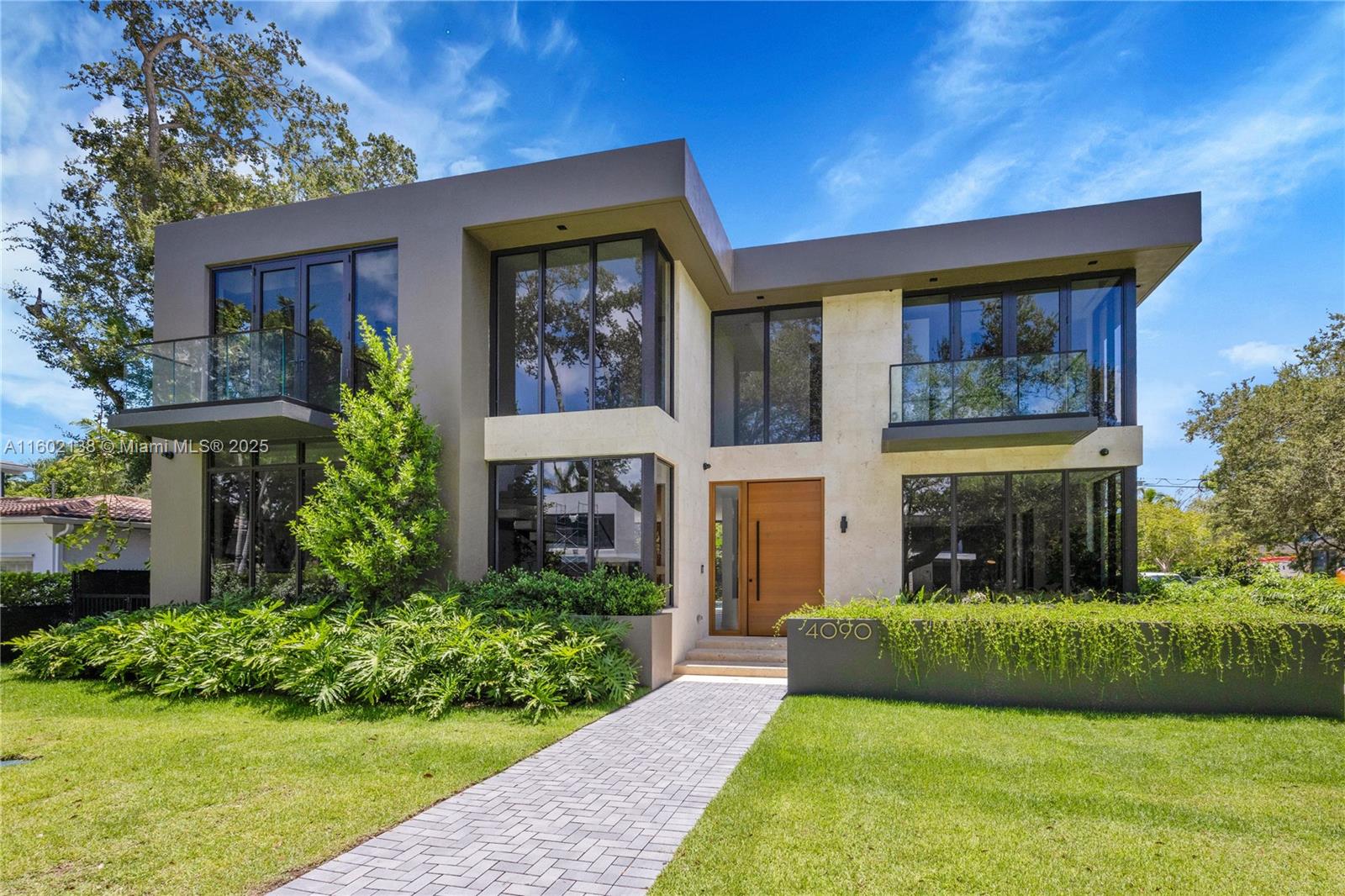 Designed by DNB Design Group and built by Avenue 04, this modern masterpiece is due for delivery in July 2025. Spanning a gracious 4,737 square feet on a 7,000 square foot lot just 1 house away from Merrie Christmas park, the 5 bedroom, 5.2 bathroom home is ideally located in Miami’s favorite neighborhood, Coconut Grove! The flexible floorplan lends itself to indoor/outdoor living and features family, living, and dining rooms, as well as a true chef’s kitchen. The 2nd floor primary suite includes 2 walk-in closets, spa-like bathroom, and private terrace with stairs leading down to the pool and patio. There are 4 additional en-suite bedrooms, pool bath, laundry room, 2 car garage, huge impact glass windows and doors, large-format porcelain tile and wood floors, and much more!