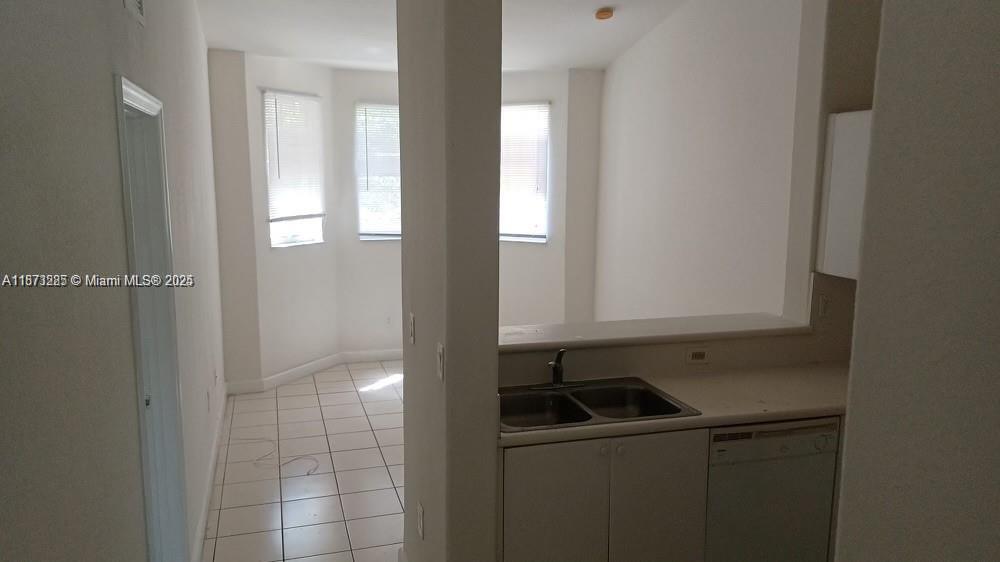 2/2 on the 2nd floor in gated community, 24-hour security, in Homestead, minutes from Turnpike, Baptist Hospital, Shopping Area, Speedway, and the Florida Keys. This is a very wellkept rental unit. Tile flooring, Central A/C, Dishwasher, Microwave, Stove ,Stainless Steel Refrigerator, and Washer Dryer are inside this unit. Amenities include a Clubhouse, pool, tiki bar, children's play area, walking trails, and plenty of visitor parking.