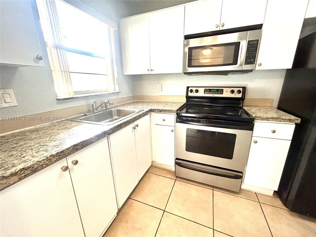 Photo of 8300 Sunrise Lakes Blvd #112, Sunrise, FL 33322 (MLS # A11941473)