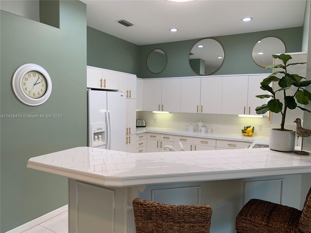 Photo of 578 NW Montevina Dr, Saint Lucie West, FL 34986 (MLS # A11438474)