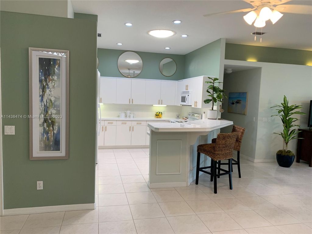 Photo of 578 NW Montevina Dr, Saint Lucie West, FL 34986 (MLS # A11438474)