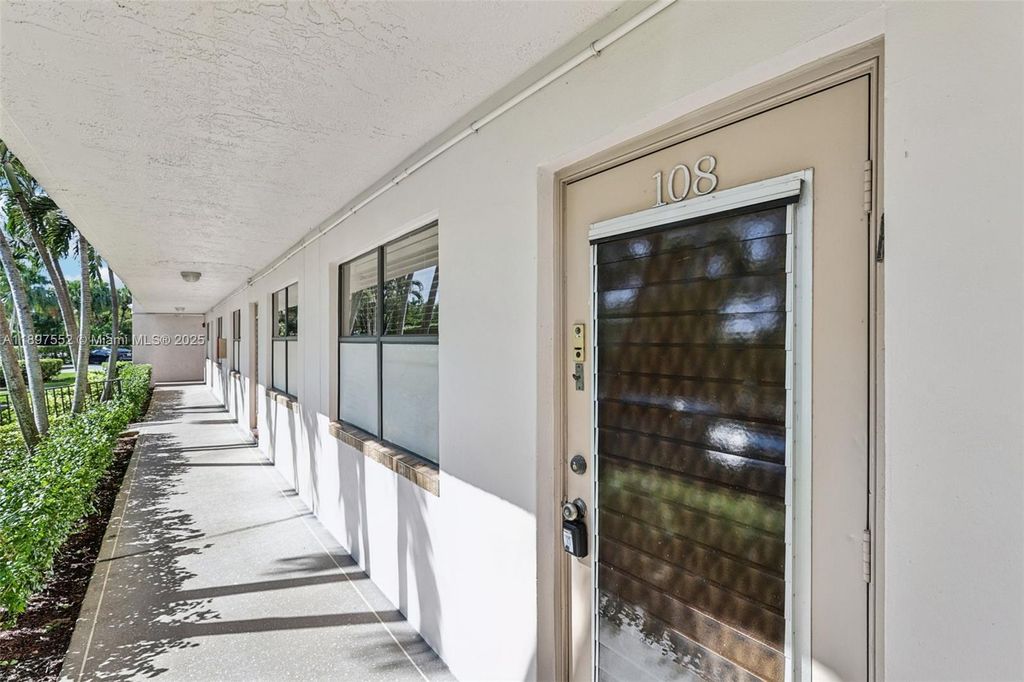 Photo of 2981 N Nob Hill Rd #108, Sunrise, FL 33322 (MLS # A11897552)