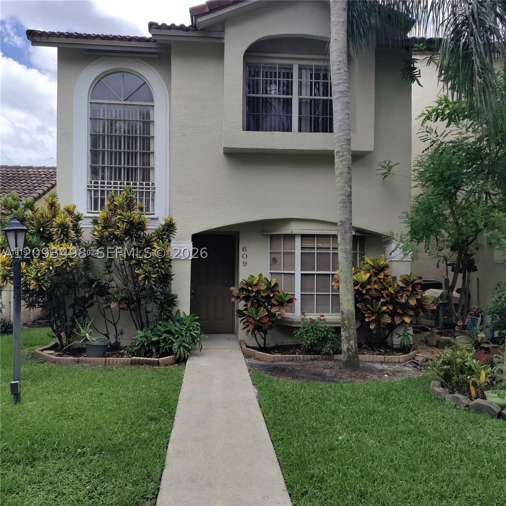 Photo of 609 NW 109th Ave #0, Pembroke Pines, FL 33026 (MLS # A12093498)