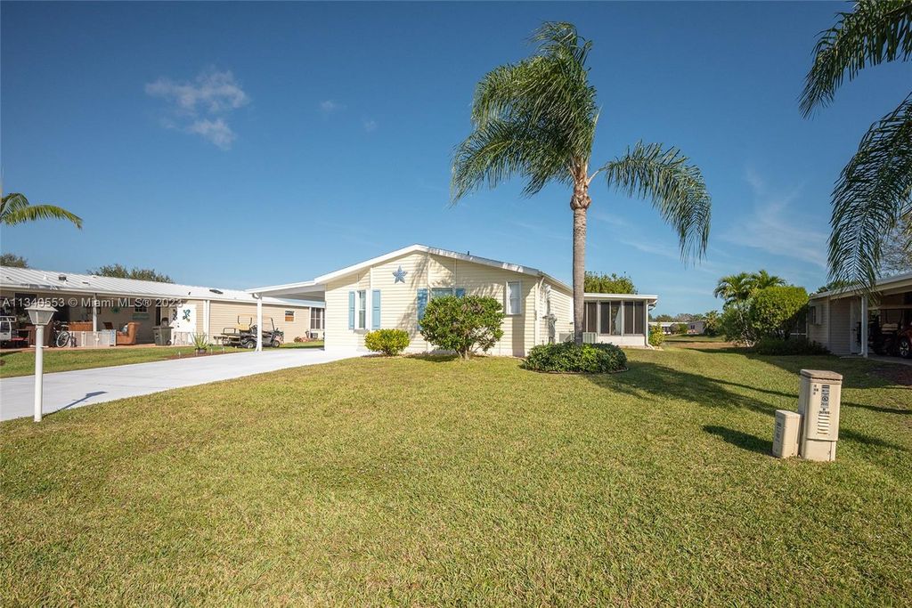 Photo of 3053 Five Iron Dr, Port Saint Lucie, FL 34952 (MLS # A11340553)