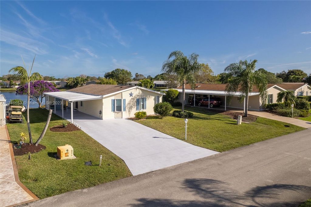 Photo of 3053 Five Iron Dr, Port Saint Lucie, FL 34952 (MLS # A11340553)