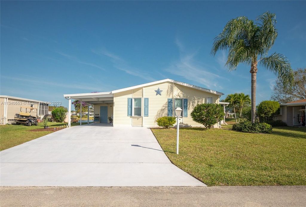 Photo of 3053 Five Iron Dr, Port Saint Lucie, FL 34952 (MLS # A11340553)