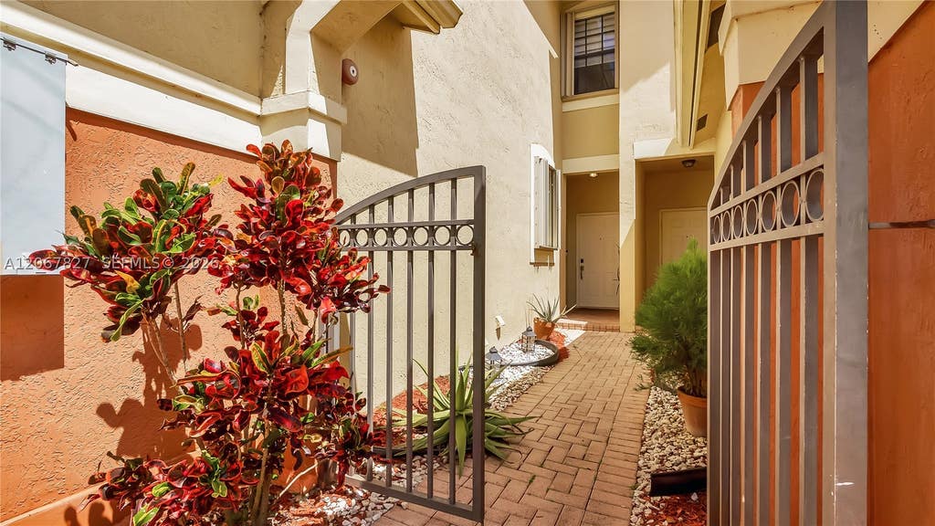 Photo of 3889 Tree Top Dr #3889, Weston, FL 33332 (MLS # A12067827)