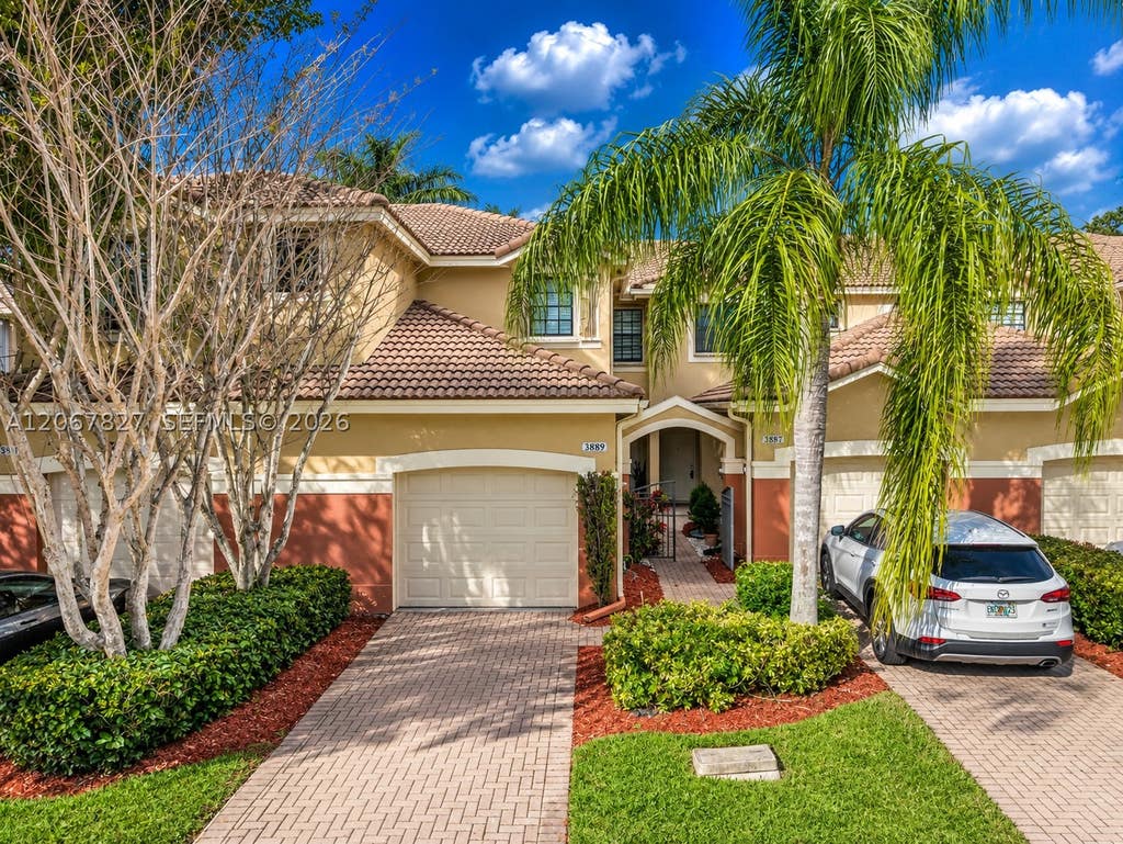 Photo of 3889 Tree Top Dr #3889, Weston, FL 33332 (MLS # A12067827)