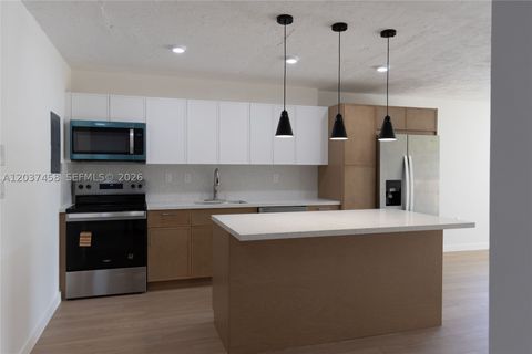 Photo of 7300 NW 17th St #112, Plantation, FL 33313 (MLS # A12037458)