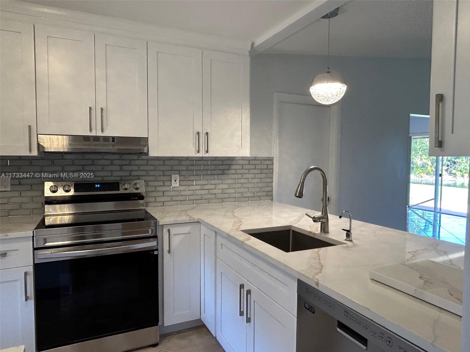 Beautifully Remodeled, Super clean and spacious 2 Bedroom, 2 Bathroom Villa, all with beautiful tile flooring with an attached 1 car garage. Brand New kitchen and appliances, quartz counter tops, huge living room and family room, large bedrooms. Patio with tons of sunlight overlooking the lake. Washer and Dryer inside the garage. Cable is included. tenant pay for water and electric and wifi. Las Verdes is a beautiful- guard gated community, very active 55+ with great recreational facilities: 3 pools, a fitness center, tennis and pickleball courts, shuffleboard, bocce ball, and several ongoing fitness classes. close to shopping, Dining, hospitals, easily accessible to Hwy. Great location