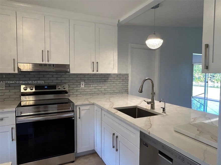 Beautifully Remodeled, Super clean and spacious 2 Bedroom, 2 Bathroom Villa, all with beautiful tile flooring with an attached 1 car garage. Brand New kitchen and appliances, quartz counter tops, huge living room and family room, large bedrooms. Patio with tons of sunlight overlooking the lake. Washer and Dryer inside the garage. Cable is included. tenant pay for water and electric and wifi. Las Verdes is a beautiful- guard gated community, very active 55+ with great recreational facilities: 3 pools, a fitness center, tennis and pickleball courts, shuffleboard, bocce ball, and several ongoing fitness classes. close to shopping, Dining, hospitals, easily accessible to Hwy. Great location