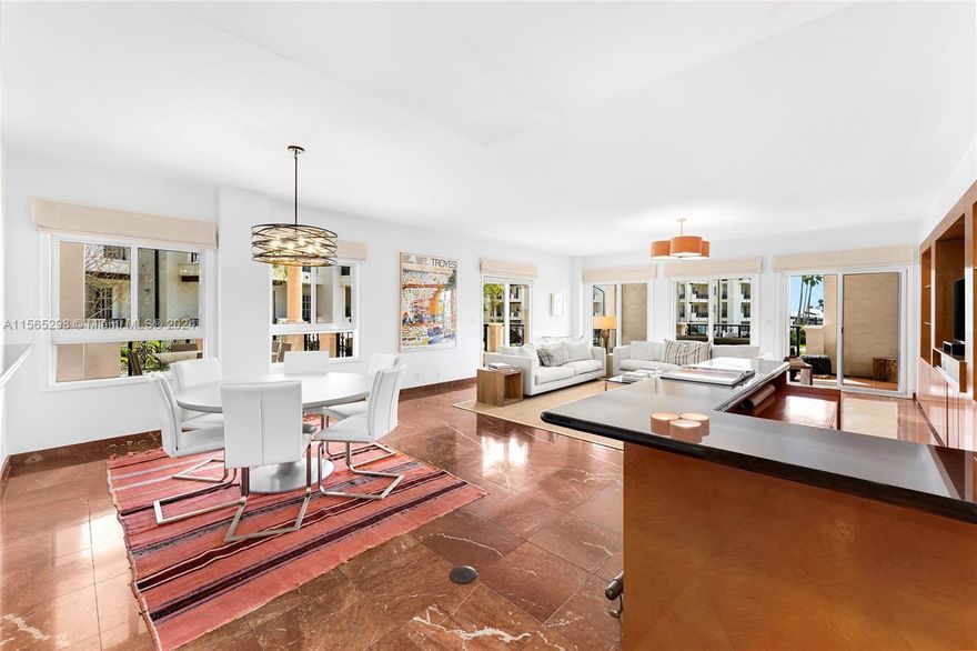 This corner unit at Bayside Village offers breathtaking views of Biscayne Bay, Fisher Island Marina, & the Atlantic Ocean. The unit features 3BR/3+1BA & 2,744 square feet of living space with 5 separate terraces. Spacious open dining & living room layout w/large windows streaming natural lighting w/access to 2 side terraces & a large bayside terrace w/direct Bay views. Kitchen sports granite counter tops & backsplash, cabinetry with built-ins, recessed lighting & a separate breakfast area. A spacious principal suite has a large walk-in closet, and direct access to the large terrace overlooking the pool, marina & bay. Principal bath boasts a walk-in glass shower, sunken spa tub & private water closet. Two other bedrooms with en-suite baths. Great location, near all Fisher’s best amenities.