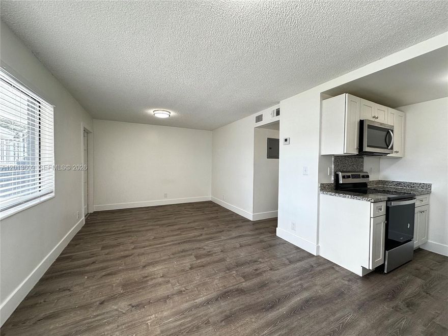 BEAUTIFUL, SPACIOUS, AND FULLY REMODELED 2-BED/1-BATH in North Central, Hollywood! Entire building has been renovated. Pristine 1st floor corner unit with gorgeous upgrades like new flooring, new appliances, new granite countertops, cabinets, and lighting. Laundry on-site + large garden area in front. Pet friendly building! Gated community. Water, waste, sewer + 1 assigned parking space in front of property included. Additional spot available for a monthly free. Located just outside of Hollywood’s Central Business District, this is an excellent place for those looking to live in the heart of the city. Nestled on a quiet street, the area boasts great schools, parks, recreation areas, and walkable, bike-friendly avenues. Close to plenty of restaurants and shops. Residents enjoy easy access to beautiful beaches, located about 10 min away / just three miles east of the area.