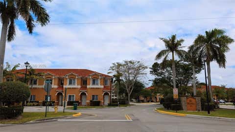 Photo of 5906 Woodlands Blvd, Tamarac, FL 33319 (MLS # A11937950)