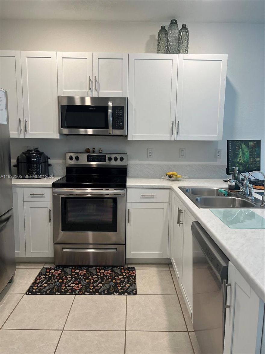 Meticulously kept 3 bedroom, 2.5 bath home is located in the highly sought-after community of The Riviera in Homestead. This modern two-story layout offers bright, open living spaces with all bedrooms conveniently located upstairs for privacy. The first floor features a spacious living and dining area, a contemporary kitchen with sleek finishes, and a guest half bath. Enjoy a 1 car garage to be used for your vehicle or extra storage. You will also find the water softener system as a huge PLUS! Upstairs you’ll find three well-sized bedrooms, including a comfortable primary suite with generous closet space and an ensuite bath. Enjoy a low-maintenance backyard perfect for relaxing or entertaining. No back neighbors! The Riviera offers resort-style amenities including a clubhouse, community pool, fitness center, and scenic lakes. Ideally situated near top schools, shopping, dining, and major highways. Move-in ready and perfect for families or investors alike.