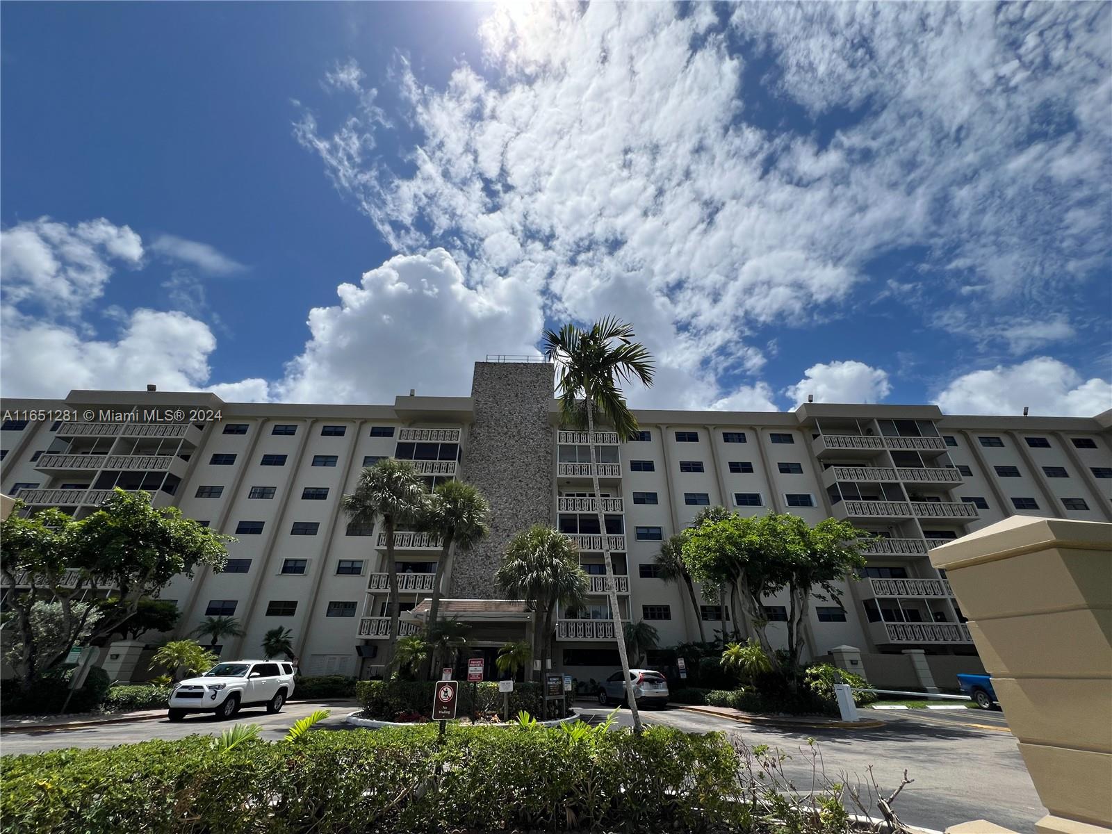 Unit is located on the top floor with a fully screened balcony with unobstructed views of canal and pool. Two large bedrooms with walk in closets. New vinyl floors, tankless water heater, and stainless steal appliances. Unit has washer and dryer hook up in unit in addition to the laundry room and private storage unit on the same floor. Building is centrally located near Aventura, North Miami, and Hallandale beach with public transportation close by. HOA covers water, cable, internet, trash, 24 hour security/concierge, valet parking, pool, BBQ, sauna, club room and storage room. Service/Emotional support animals allowed.