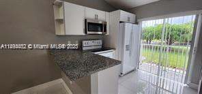 IMAGES OF KENDALL CONDO - Residential Lease