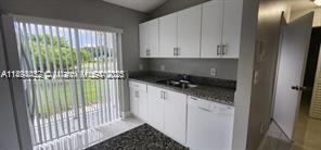IMAGES OF KENDALL CONDO - Residential Lease