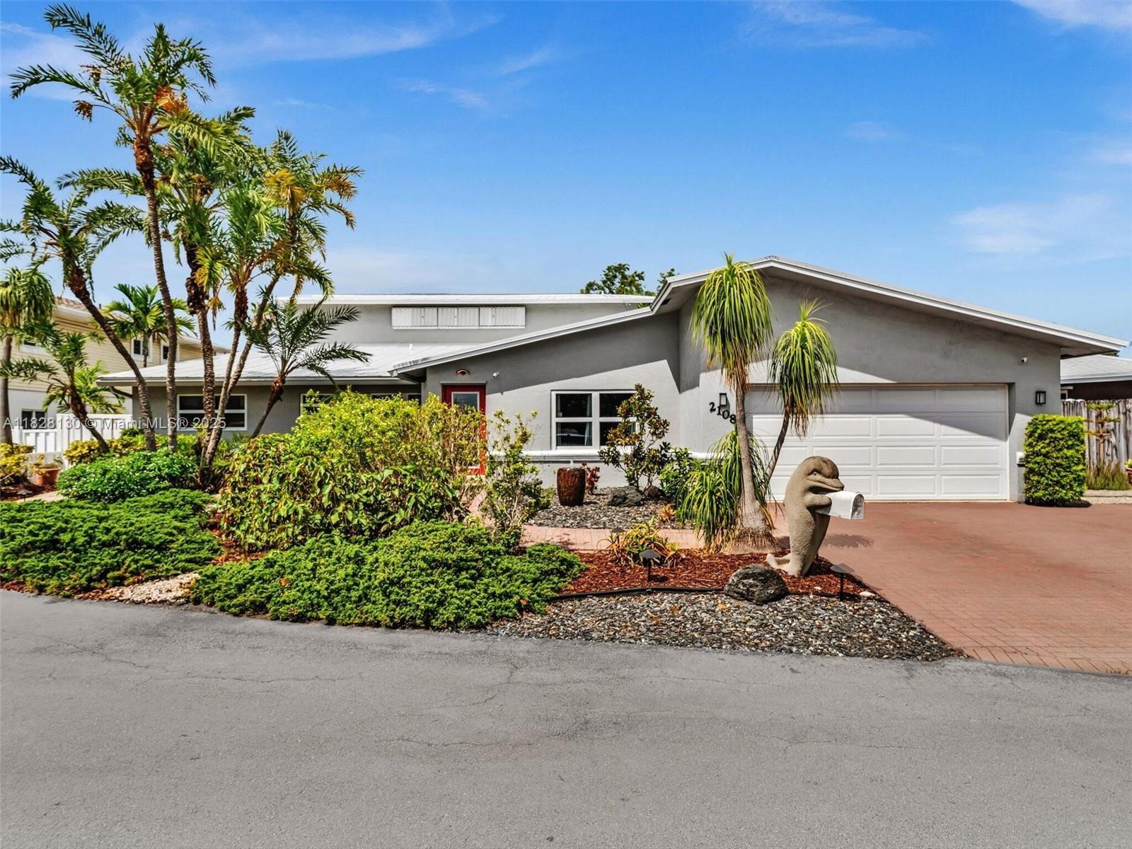 Home for entertaining. Ocean access. Dock available. View is lake; not canal. Faces west for ultimate sunsets. 2 sets of sliding doors open to pool and outdoor bar/deck. Zero scape: Indigenous and exotic plants/trees. No grass to mow. parking in 3 car driveway plus 2.5 car garage; new epoxy floor. Street is double cul de sac. 2nd floor is master suite w private balcony. 1st floor can be mother-in-law or private guest suite. separate entrance. 2 newly remodeled bathrooms and new granitzite counters in kitchen. Large laundry and new master closet with attic access for optimum storage. Energy efficient; 5 min from everything.