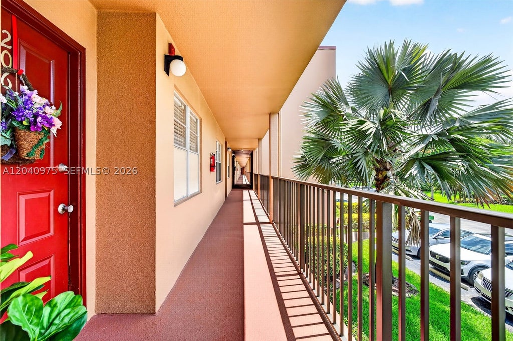 Photo of 300 SW 130th Ter #206B, Pembroke Pines, FL 33027 (MLS # A12040975)