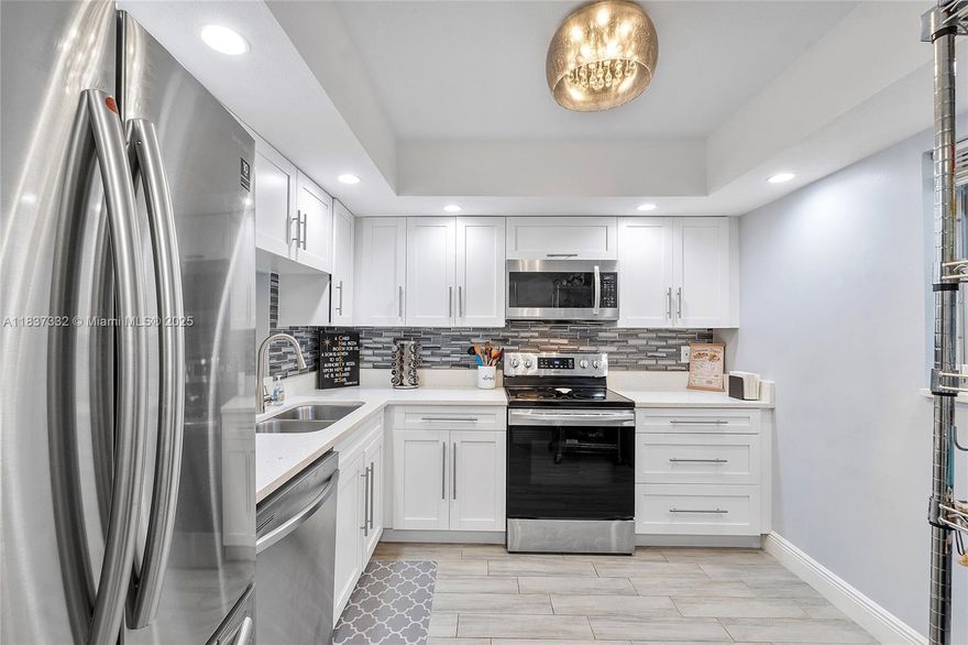 MOTIVATED SELLER! CASH ONLY. No renting allowed. Move-in Ready Beauty in Coral Springs. Welcome home to this beautifully renovated 1st-floor 2-bedroom, 2-bath condo nestled in the vibrant heart of Coral Springs! Step inside and fall in love with the brand-new A/C unit, sleek quartz countertops, stylish backsplash, and modern LED faucet—all part of a high-end kitchen upgrade with stainless steel appliances. Enjoy the luxury of two fully remodeled bathrooms, fresh tile flooring, elegant crown molding, updated fixtures, and crisp new baseboards throughout. Unwind on your screened-in patio with tranquil water views, perfect for morning coffee or evening relaxation. This condo is the perfect blend of style, comfort, and convenience. Don’t miss out on this gem!