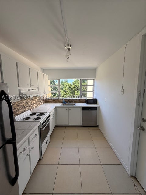 Photo of 952 NE 199th St #4K, Miami, FL 33179 (MLS # A12066378)
