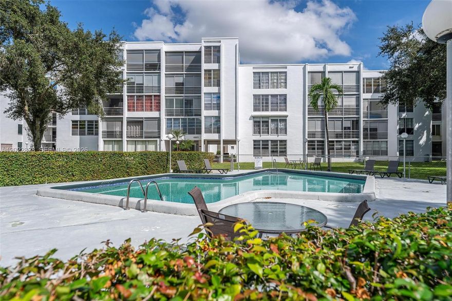 YOU WILL FALL IN LOVE THE MOMENT YOU WALK IN TO THIS BEAUTIFUL, ONE OF A KIND,  CREATIVE, ARTISTIC, UNIQUE CONDO. IMMACULATE, AIRY, LIGHT AND BRIGHT THROUGHOUT. OPEN SPACIOUS FLOOR PLAN.  UPGRADES GALORE! IMPACT WINDOWS. NEW ROOF, ACCORDION/ELECTRIC SHUTTERS, BRAND NEW LAMINATED FLOORS,, NEWER AC ,NEWER WATER HEATER AND MORE. SPECTACULAR FORMAL DINING ROOM, INVITING LARGE LIVING ROOM, AMPLE SIZED BEDROOMS. MASTER BEDROOM HAS TWO CLOSETS & CLOSETS IN BOTH BEDS HAVE BUILT INS. PEACEFUL AND TRANQUIL EXSPANSIVE SCREENED PATIO. BRIGHT AND OPEN SPACIOUS KITCHEN WITH LOTS OF CABINETS AND COUNTER TOPS-GREAT FOR COOKING. UPGRADED LIGHT FIXTURES, EXTERIOR STORAGE UNIT-LOTS OF STORAGE SPACE!  CLOSE TO RESTURANTS, ENTERTAINMENT, PARKS, MAJOR ROADWAYS AND MORE. 20 MINUTES TO FT LAUD AIRPORT.  COMMUNITY HEATED POOL.