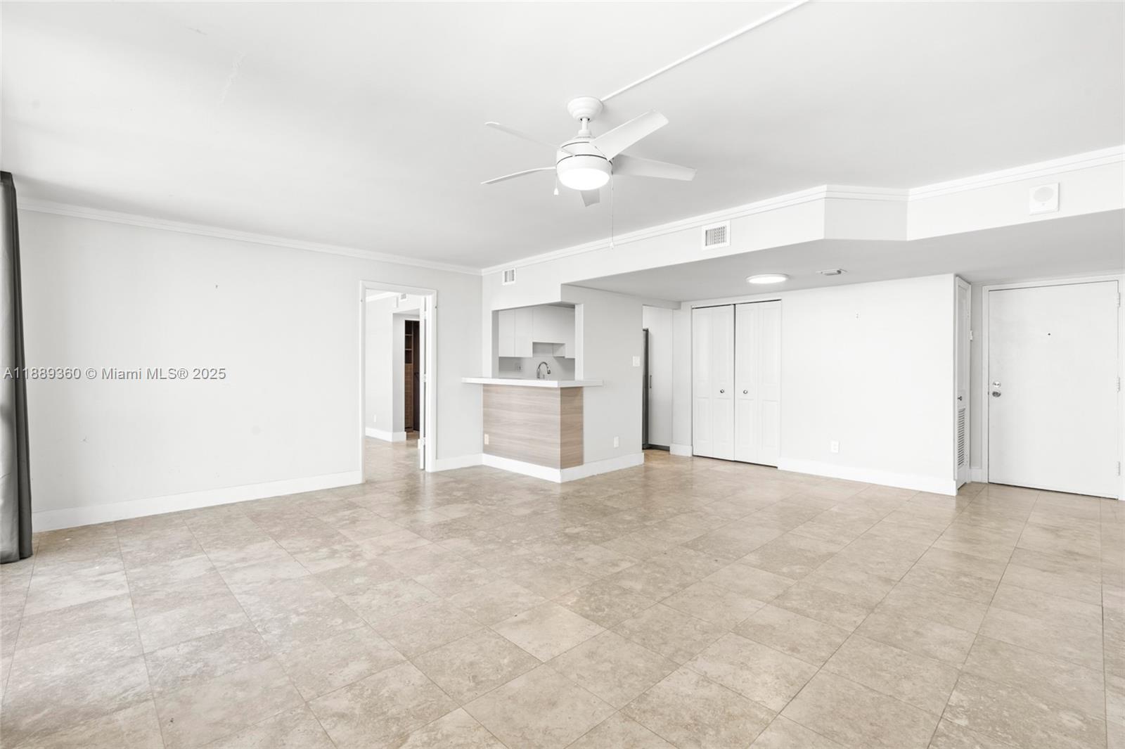 Stunning 2BR/2BA waterfront condo in gated Eastern Shores! This spacious 1,132 SF residence features marble floors, updated kitchen and baths, impact windows, newer A/C and water heater. Enjoy breathtaking wide-water views from your private balcony. The community offers resort-style amenities including a pool, tennis courts, gated entry, and available boat dock rentals—perfect for boaters. Two assigned parking spaces add convenience. Ideally located just minutes to Sunny Isles Beach, Aventura Mall, Oleta River State Park, dining, and entertainment. Move-in ready and rentable immediately after closing, this condo is ideal as a primary home, vacation retreat, or investment property in desirable North Miami. Building just went through a renovation of common areas.