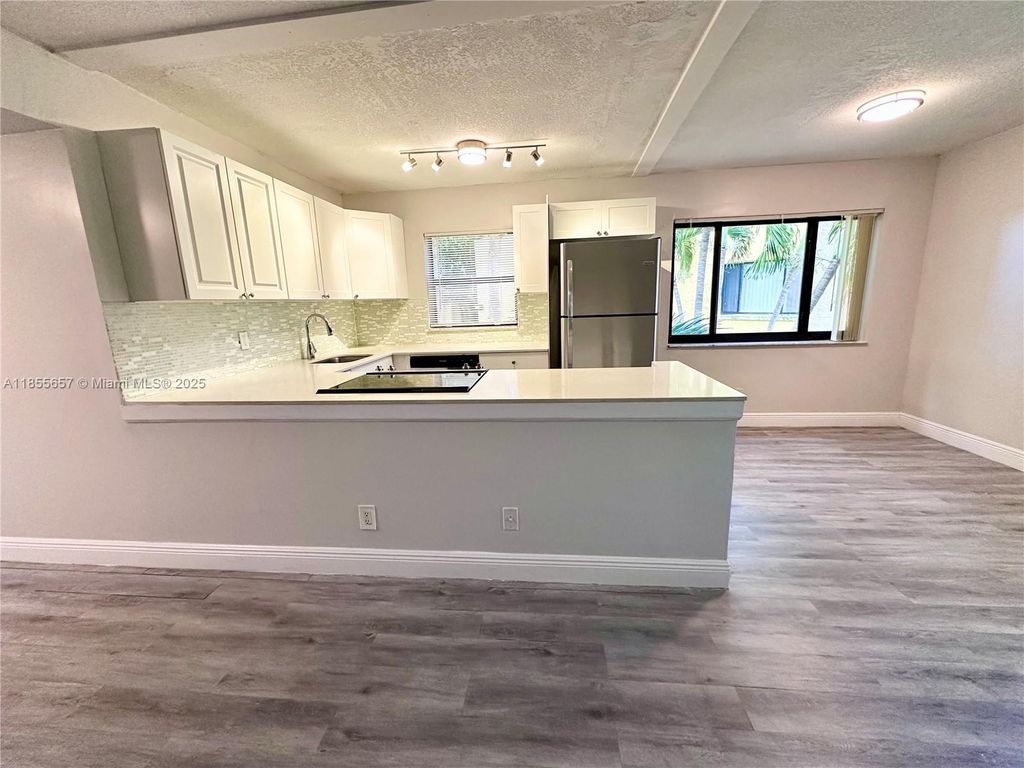 Photo of 120 Meadows Cir #120, Boynton Beach, FL 33436 (MLS # A11855657)