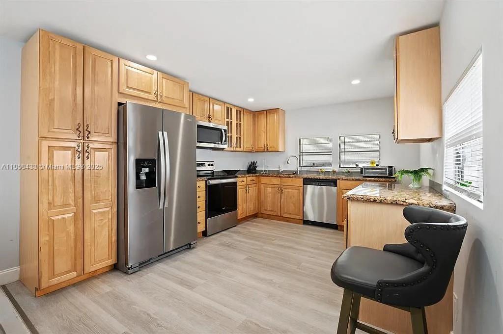 Adorable and affordable! This beautifully renovated 2/1 mobile home is full of charm and natural light. Featuring a stunning kitchen, new blinds, washer & dryer, and a cozy layout, it’s move-in ready—furnished or unfurnished. New roof (2023). Located near great schools and shopping, offering comfort and convenience in one perfect package.