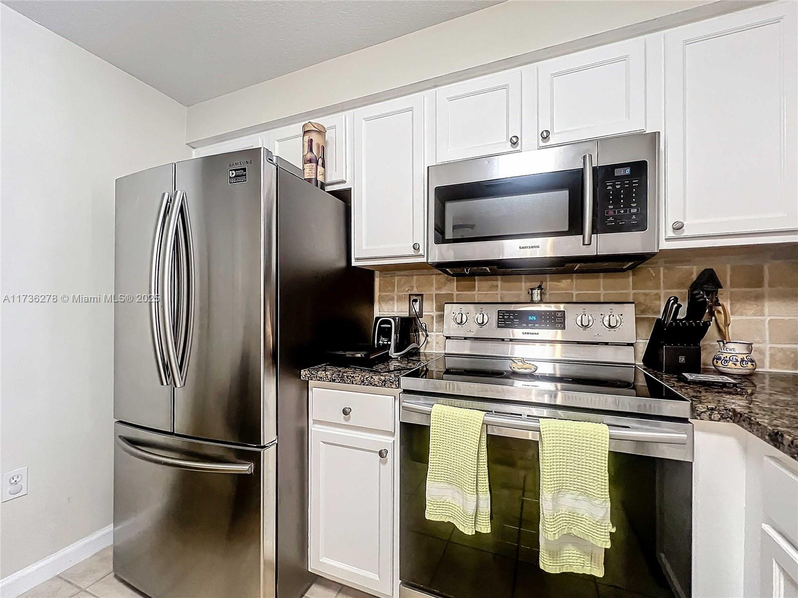 SOMERSET AT ABACOA CONDO - Residential