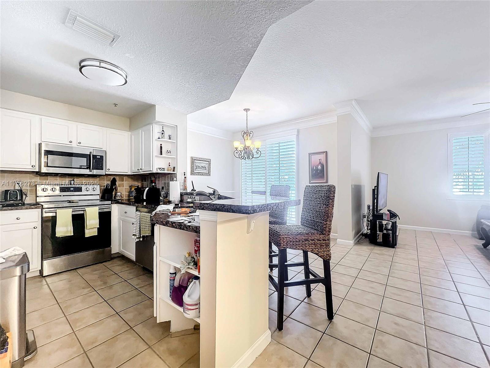 SOMERSET AT ABACOA CONDO - Residential