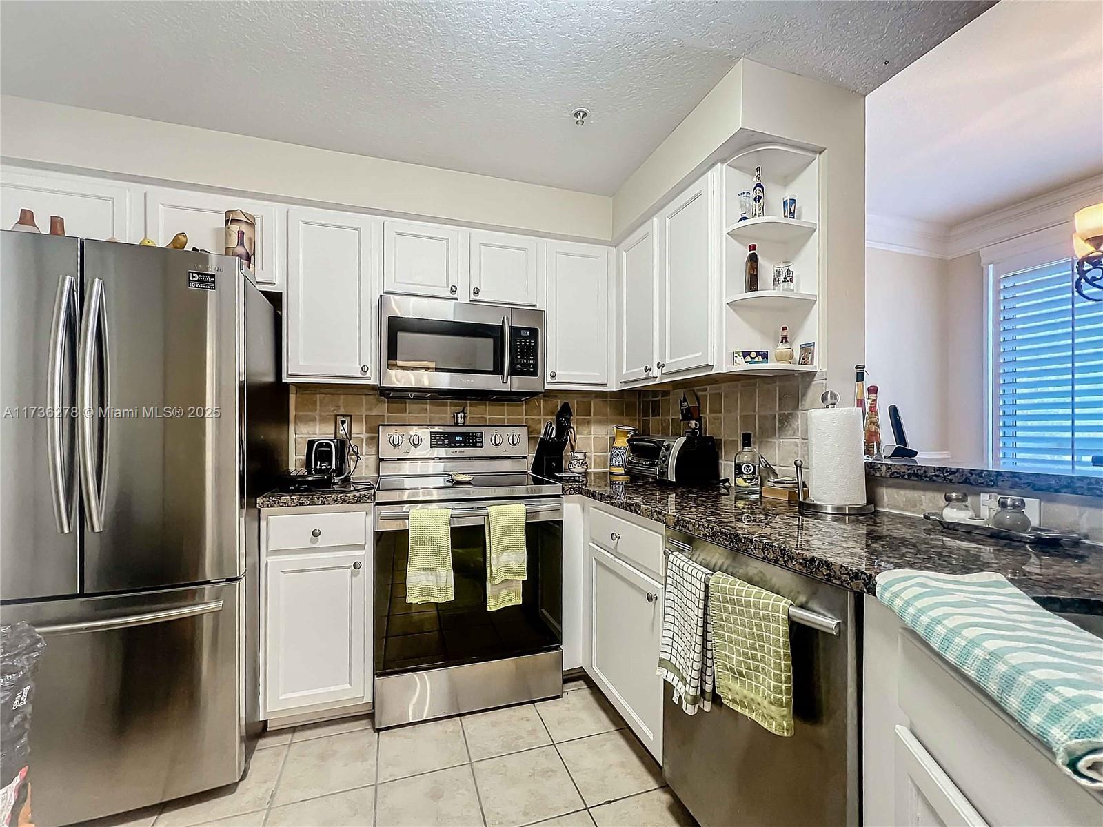 SOMERSET AT ABACOA CONDO - Residential