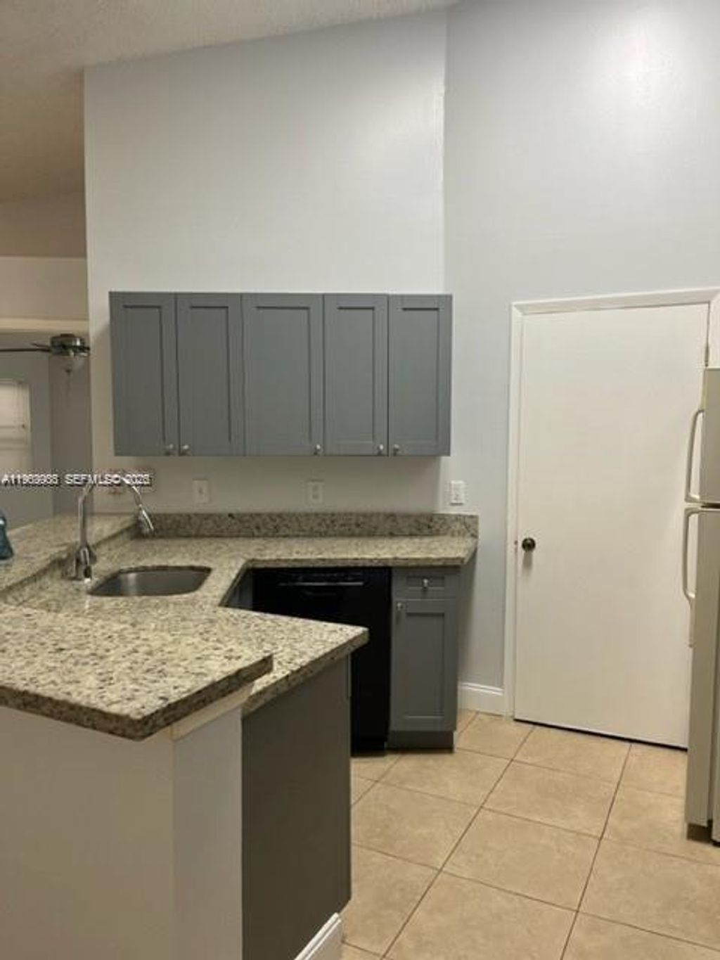 Photo of 9999 Summerbreeze Dr #1009, Sunrise, FL 33322 (MLS # A11963903)
